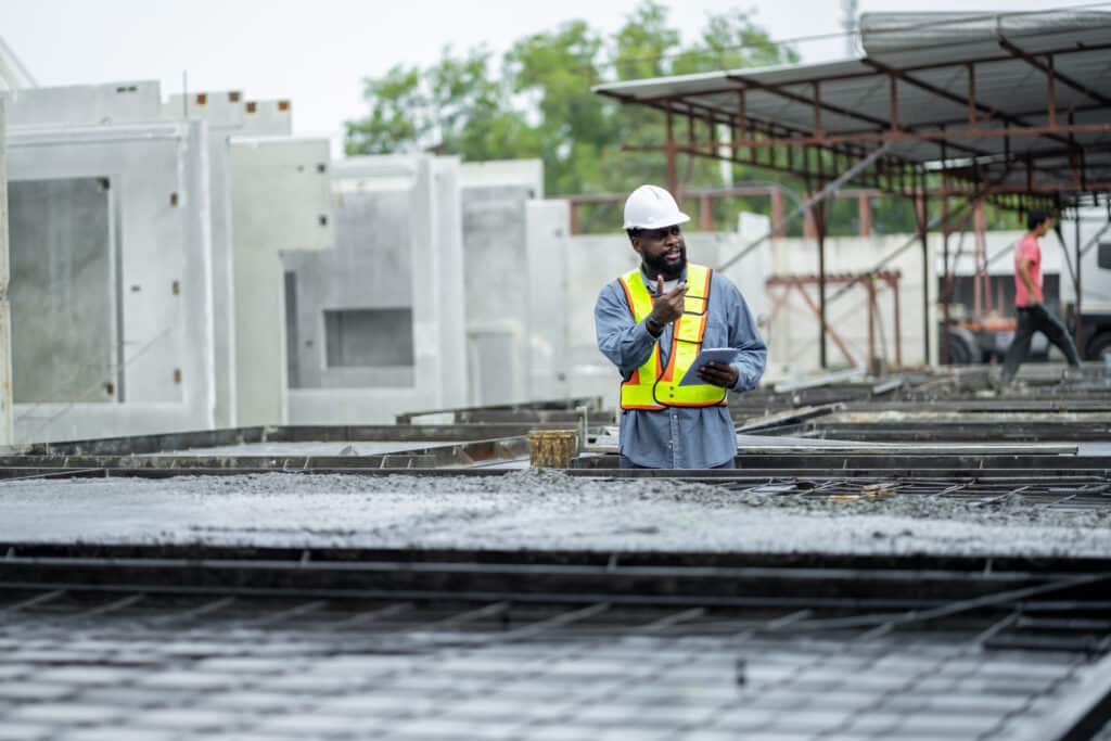 Maintenance worker, estimating the costs of flat roof leaks - Select FRR